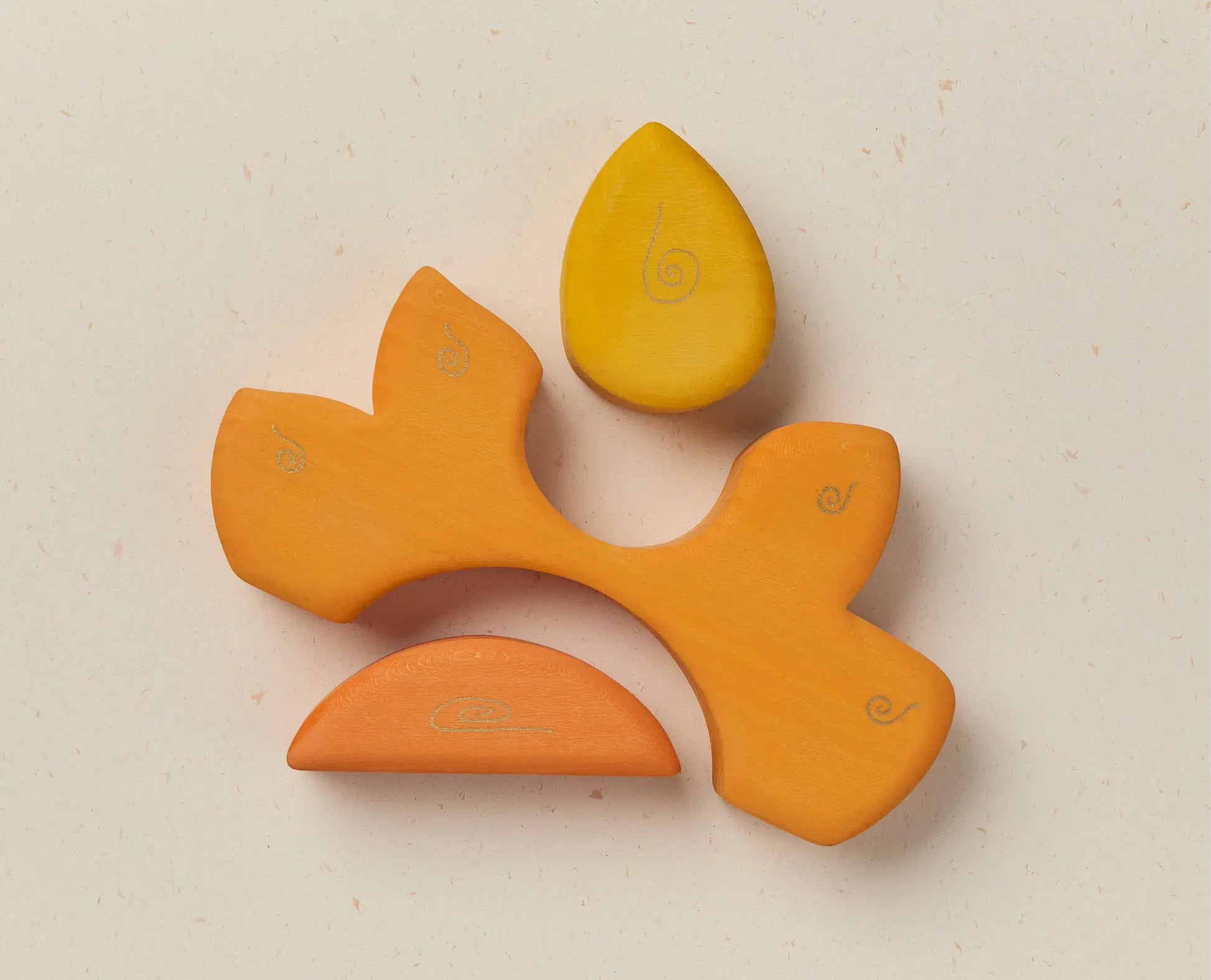 Yellow wooden stacker on a light beige background