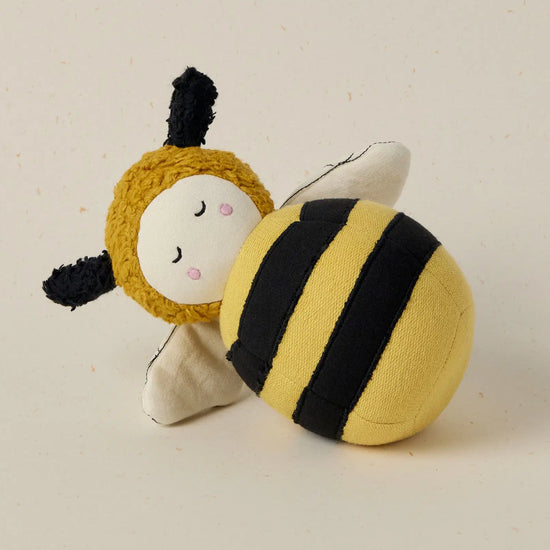 Toy bee with a plain background