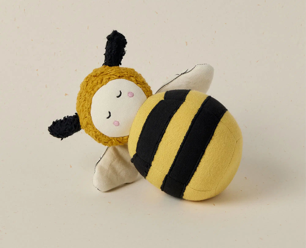 Toy bee with a plain background